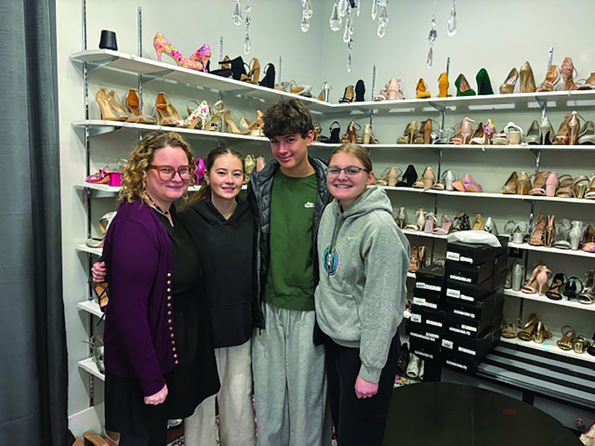 Straits Area YAC members visit Chelsea's Closet to see some of their grant funding at work for fellow youth.