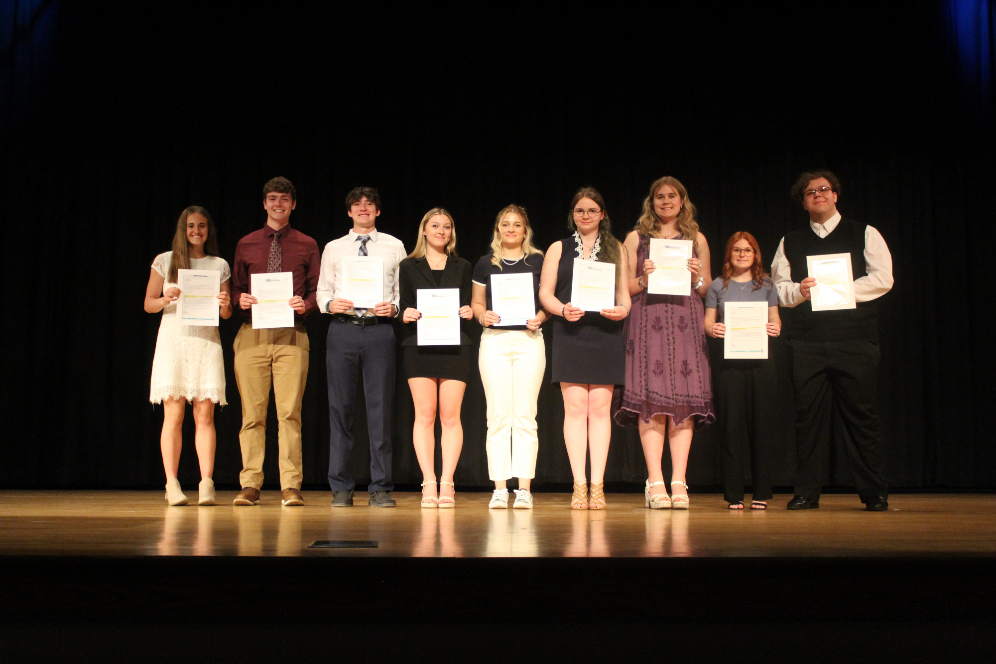 Recipients of the Dee Brown Perry Scholarship receive their awards at Alcona High School’s awards night in May 2025.
