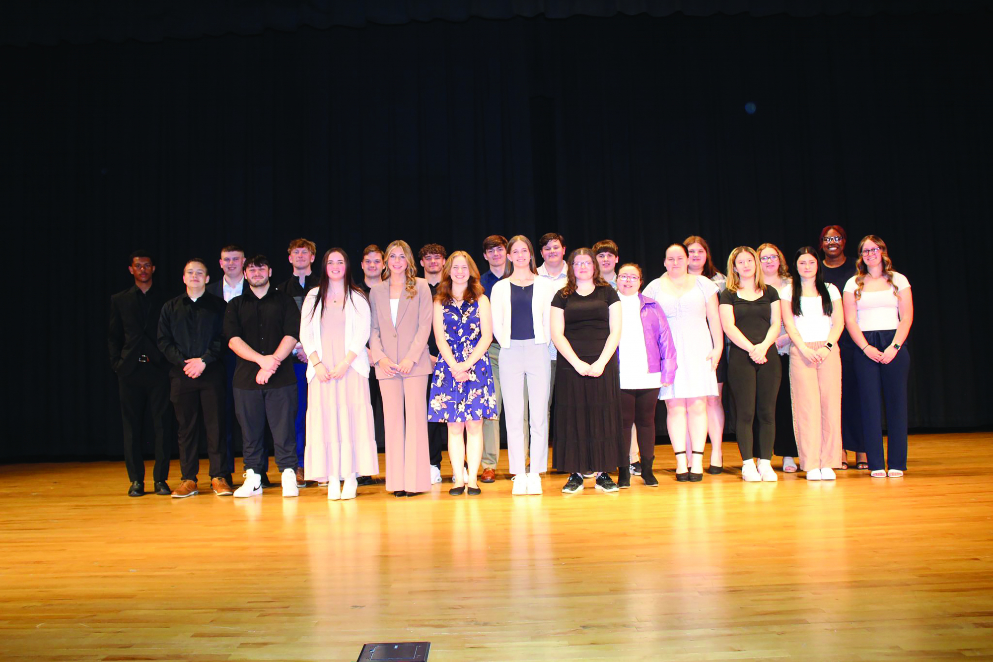 : Recipients of the Dee Brown Perry Scholarship receive their awards at Alcona High School’s awards night in May 2026.