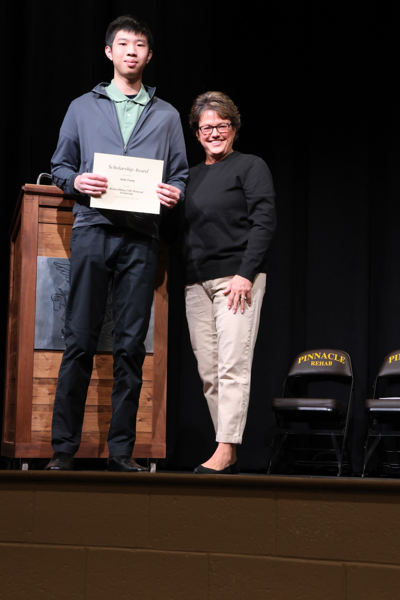 Julie Elliott presents the ESP Richard Riling Memorial Scholarship to Andy Liang.