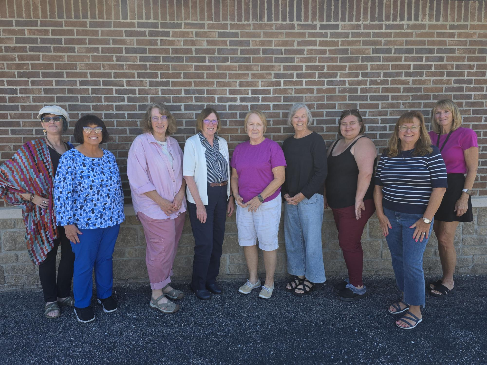 2026 Northeast Michigan WGC Committee members, left to right: Kathleen Carignan, Dr. Lisa Hilberg, Angela Addington, Mary Linton, Nancy Szejbach, Ann Burton, Stacie Anderson, Melissa LaCombe, and Erin Kieliszewski. Not pictured is Ann Boyk.